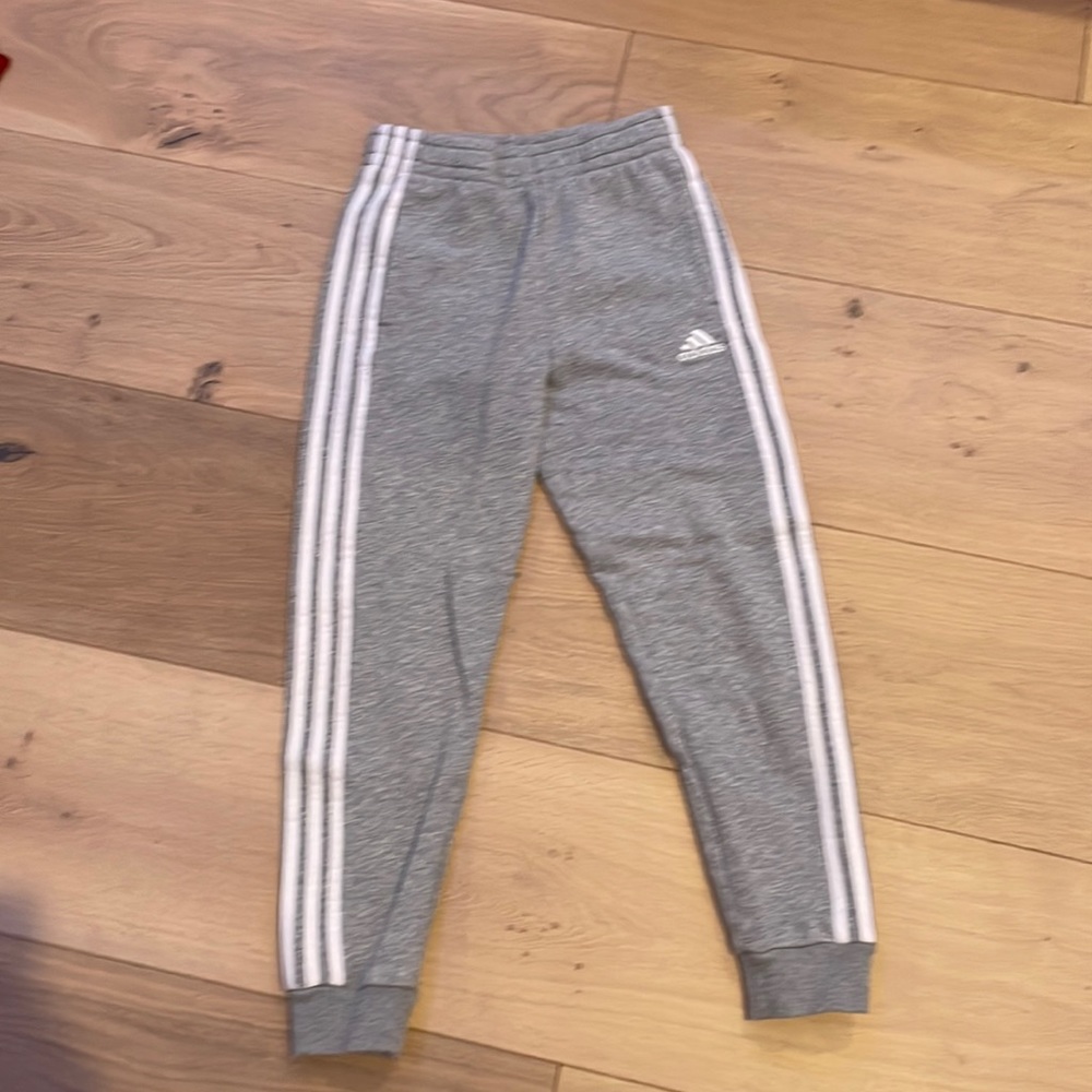 Adidas sweatpants.